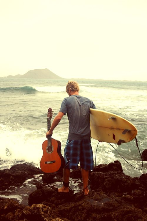 Surfer on the rocks